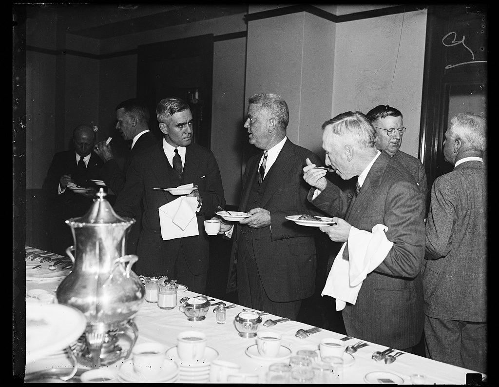 Harris and Ewing, 1935 — Chamber of Commerce directors meet the press five weeks after Social Security was signed