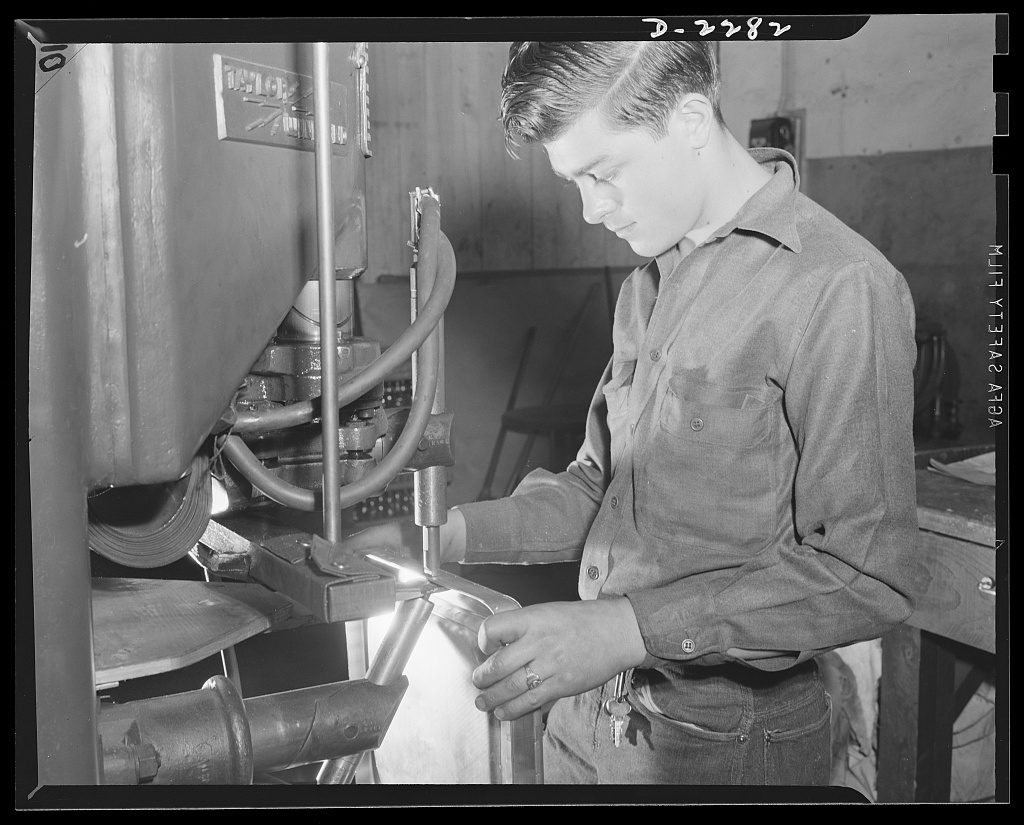 Howard R. Hollem, OWI, 1942 — William Choly, nineteen, who learned welding in the CCC