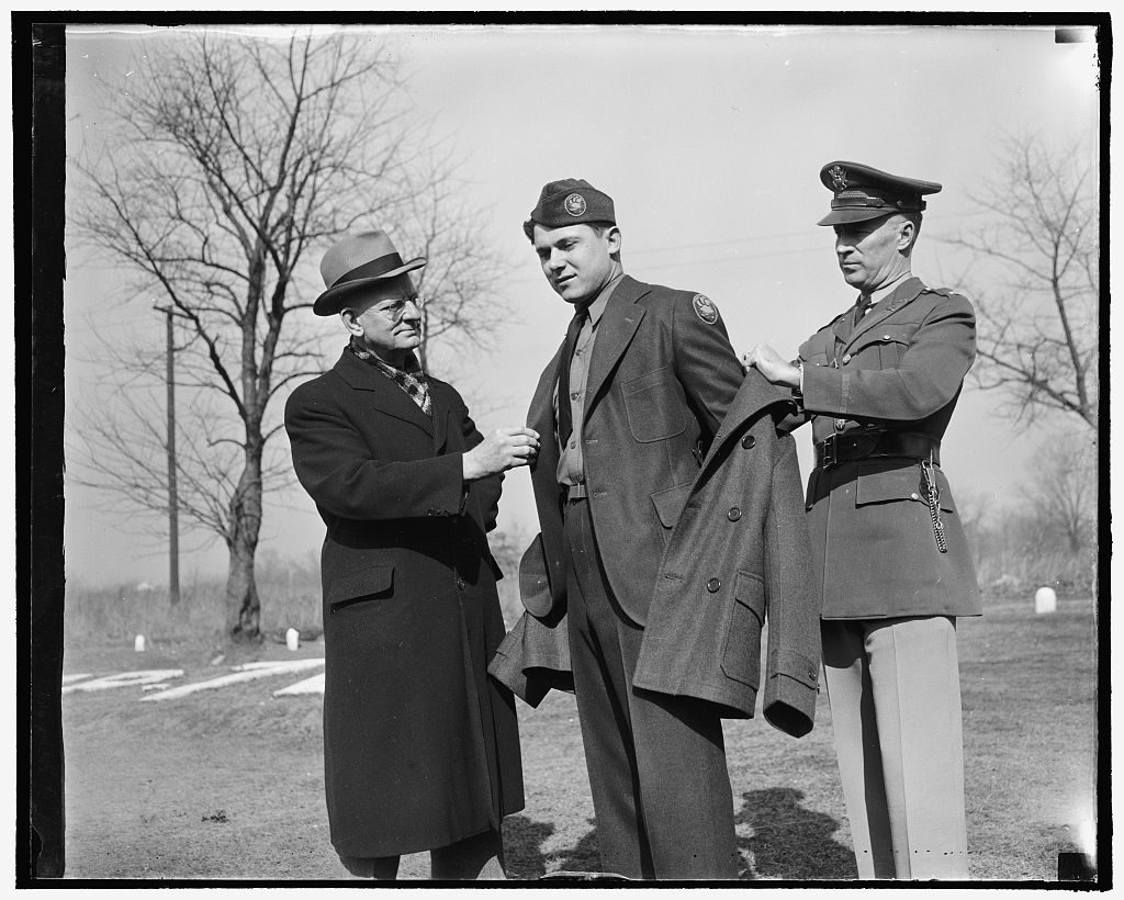 Harris and Ewing, 1939 — the Director of the CCC inspects the new uniform